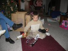Trevor plays with his new toys