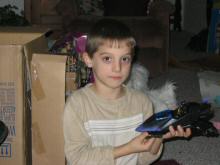 Trevor shows off his new Batman toy