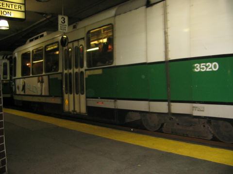 The green line train going by underground